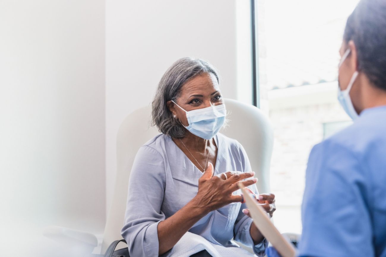 Patient som pratar med sin läkare